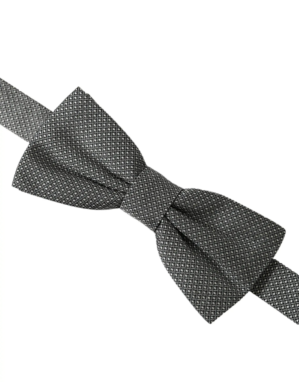 Un nœud papillon dolce & gabbana gris en soie avec un motif géométrique subtil et un tissu lisse