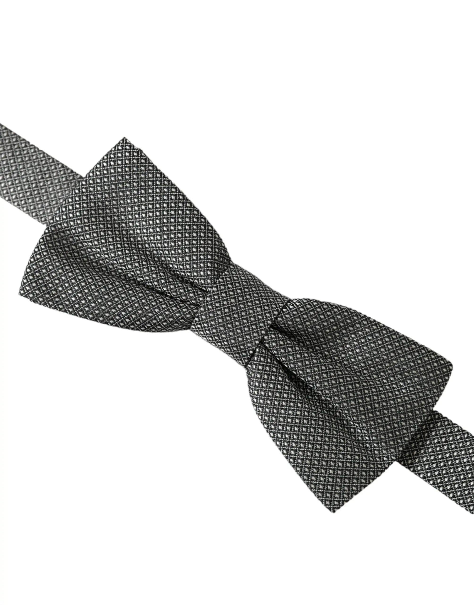 Un nœud papillon dolce & gabbana gris en soie avec un motif géométrique subtil et un tissu lisse
