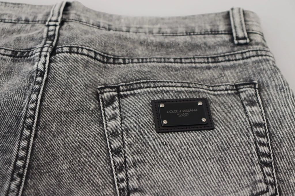 Jeans en denim gris dolce & gabbana slim fit avec patch cuir noir et couture argentée au dos