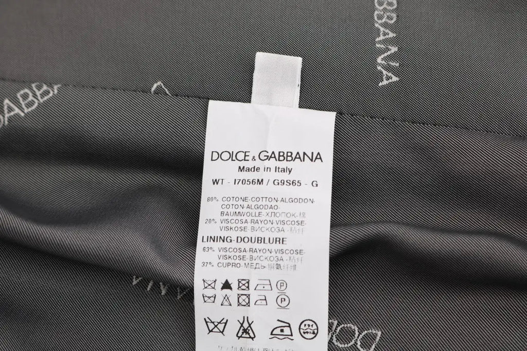 Étiquette d entretien noire dolce gabbana avec texte blanc et composition multilingue pour veste grise staff coton rayonne