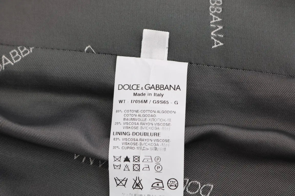 Étiquette d entretien noire dolce gabbana avec texte blanc et composition multilingue pour veste grise staff coton rayonne