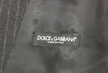 Étiquette noire dolce & gabbana en tissu gris foncé à rayures fines sur gilet en laine gris dolce & gabbana