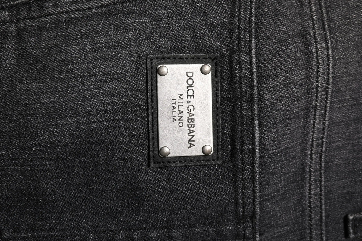 Jean denim gris délavé en coton dolce & gabbana avec étiquette rectangulaire argentée et rivets au dos