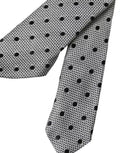 Cravate homme ajustable en soie dolce gabbana gris avec pois noirs audacieux et texture tissée subtile
