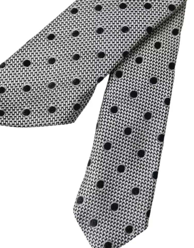 Cravate homme ajustable en soie dolce gabbana gris avec pois noirs audacieux et texture tissée subtile