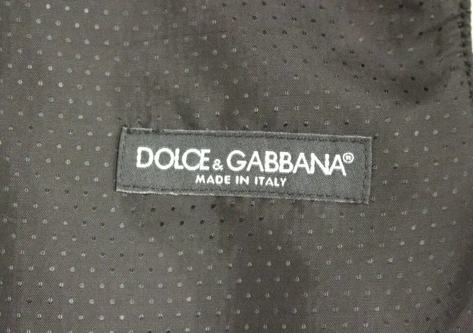 Gilet dolce gabbana en mélange de laine gris avec tissu noir perforé et étiquette cousue made in italy