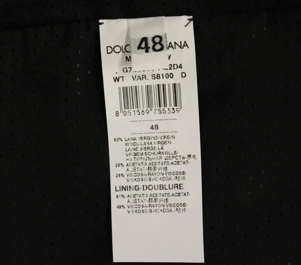 Étiquette blanche dolce gabbana avec texte noir et code-barres sur gilet gris en mélange laine