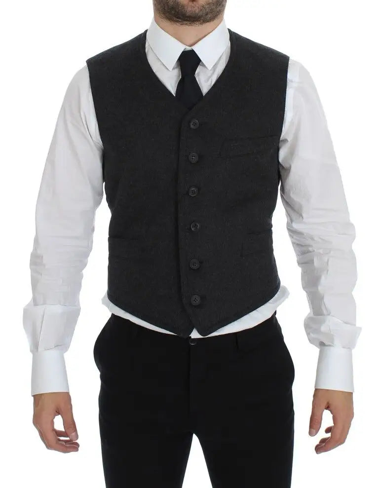Gilet dolce & gabbana en laine grise avec cinq boutons noirs et tissage texturé subtil