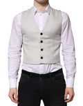 Dolce & gabbana gris gilet homme en laine avec boutons noirs et poches latérales discrètes pour tenue formelle