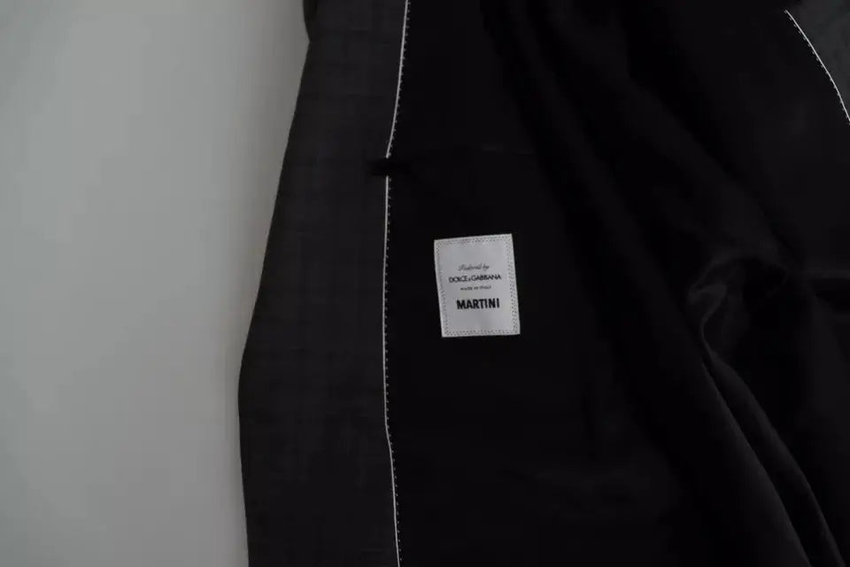 Veste martini noire dolce gabana en laine avec surpiqûres blanches et étiquette de marque visible