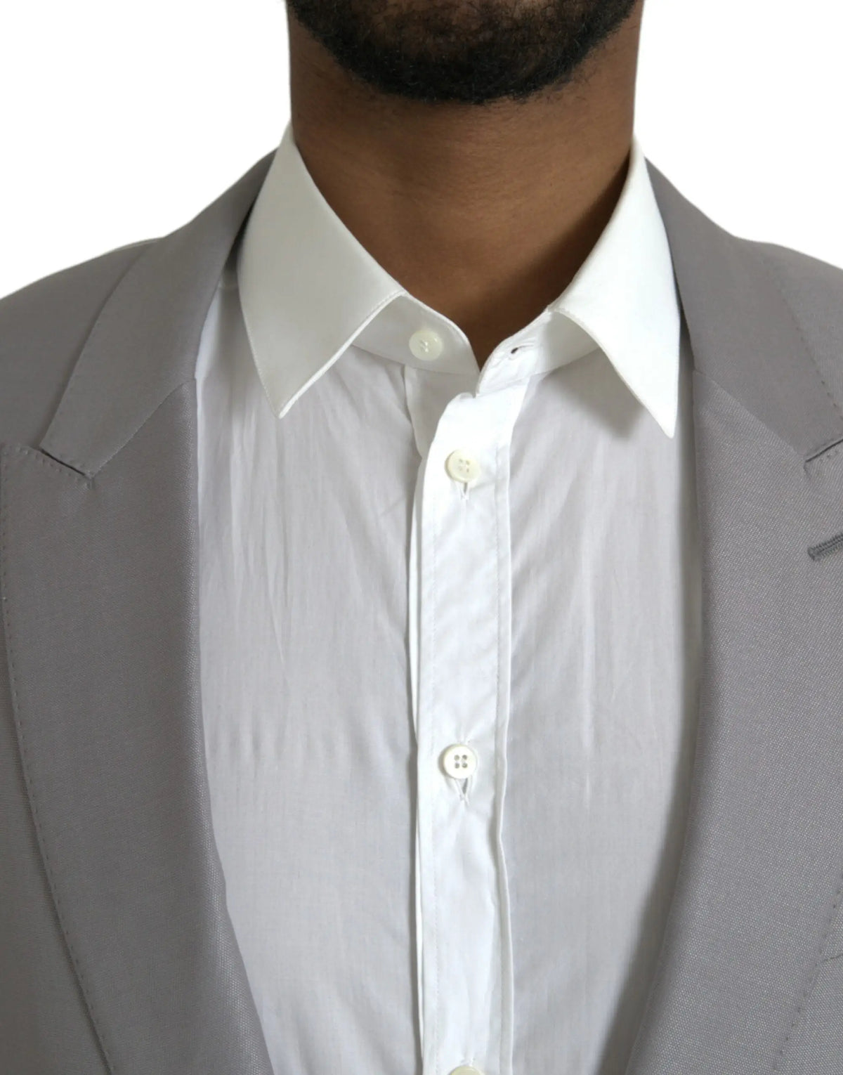 Dolce & gabbana manteau blazer gris en laine à col à revers porté sur une chemise blanche classique boutonnée