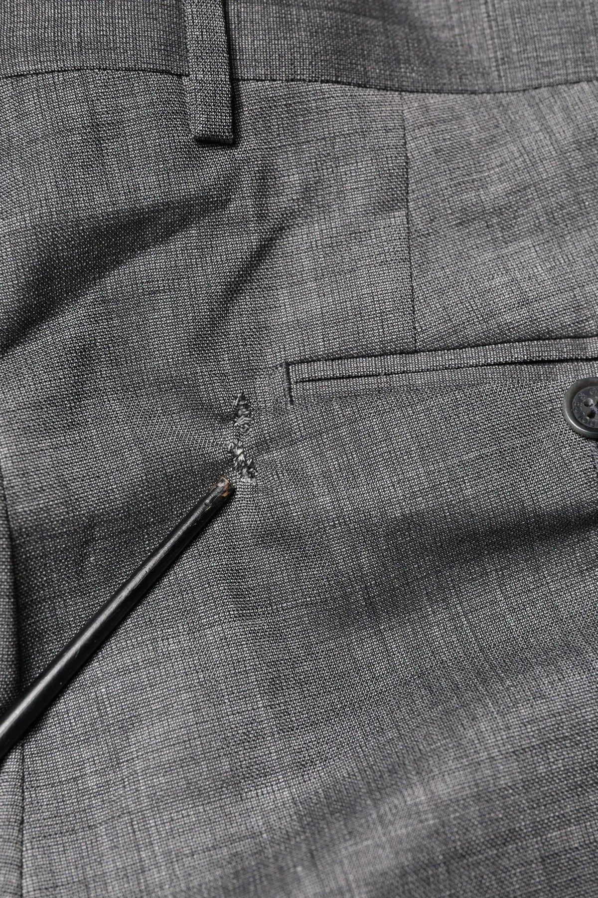 Pantalon en laine grise à texture herringbone avec fermeture à bouton unique dolce & gabbana