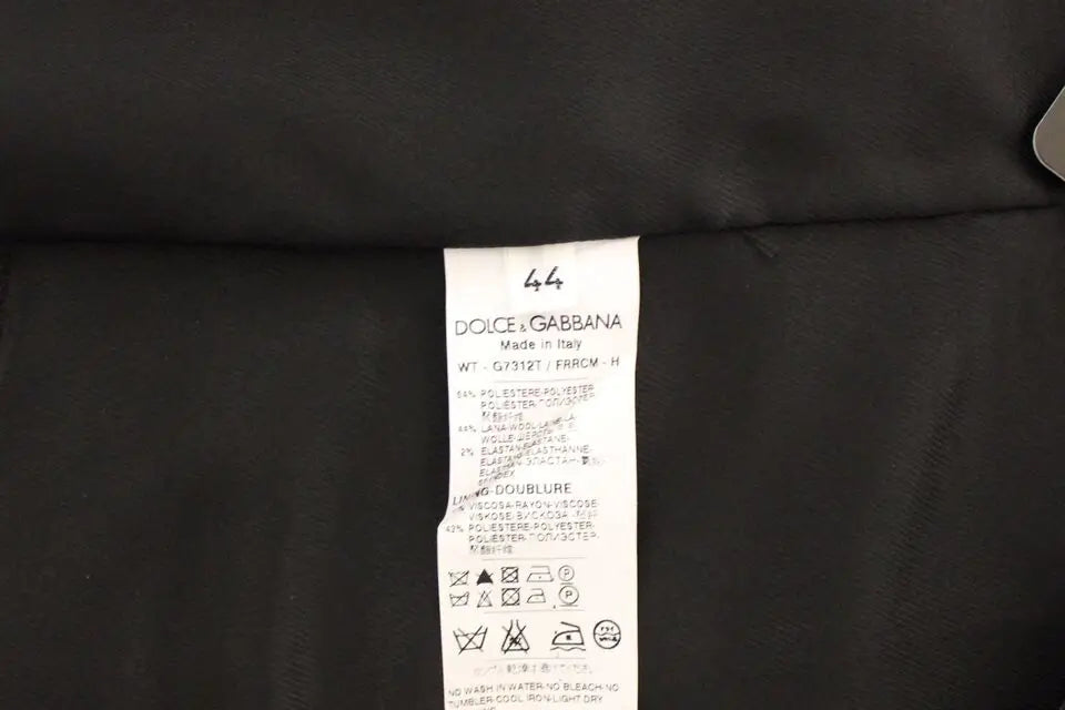 Étiquette d entretien noire dolce & gabbana avec texte blanc au dos d un gilet blazer en laine grise stretch