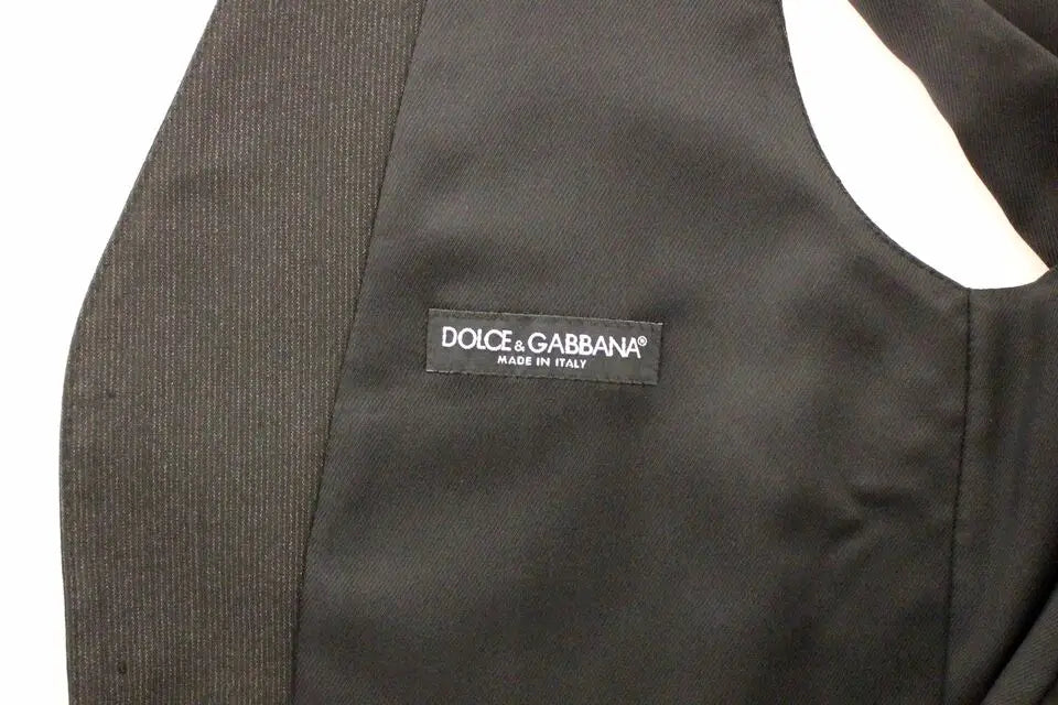 Étiquette noire dolce & gabbana made in italy cousue sur un blazer gilet robe gris en laine stretch