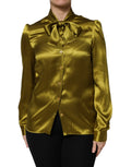 Blouse dolce & gabbana vert olive en satin avec col ascot et manches longues bouffantes
