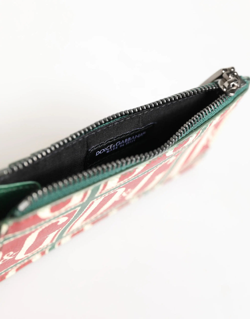 Pochette zippée dolce & gabbana en cuir vert avec motif monogramme rouge et vert pour cartes