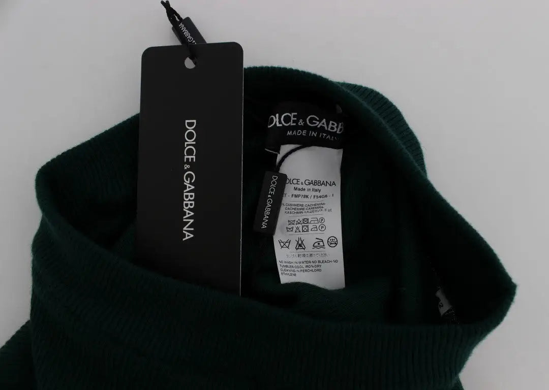 Pull en maille vert foncé dolce & gabbana avec col et poignets côtelés associé à des pantalons vert cashmere stretch