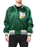 Veste bomber dolce & gabbana verte en satin avec bord crème, boutons noirs et patch logo dg brodé coloré sur la poitrine