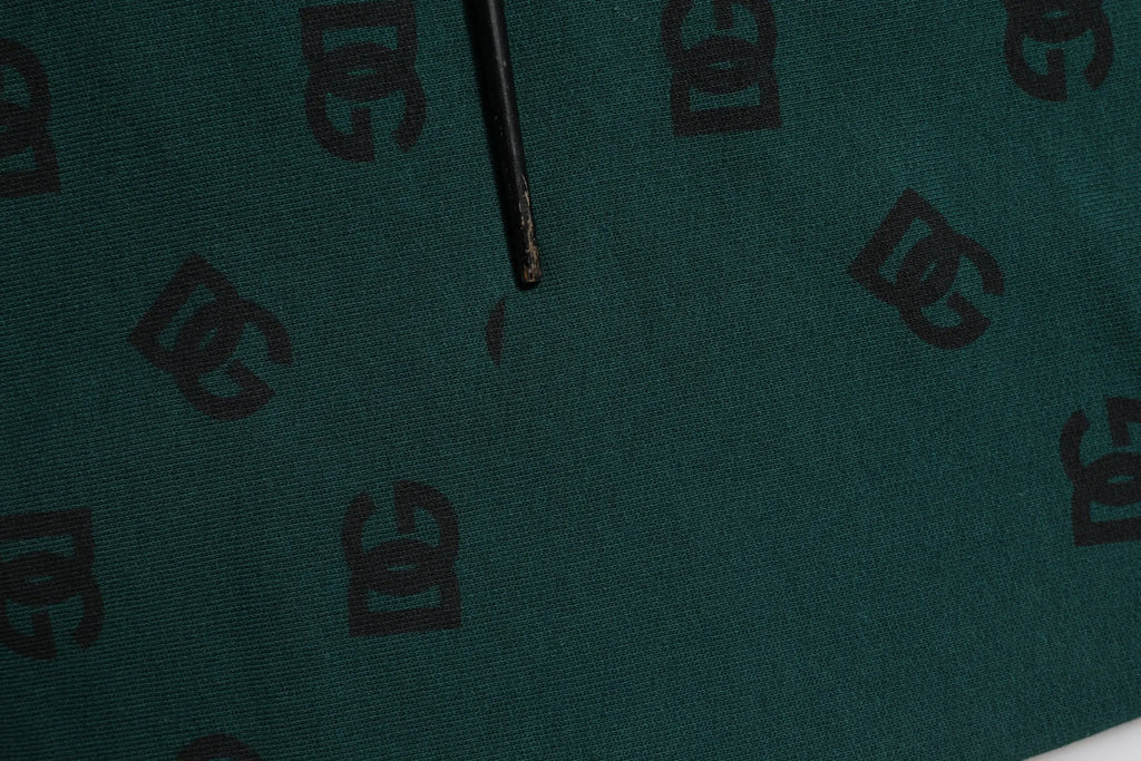Pantalon de jogging homme dolce gabbana vert en tissu foncé avec motif répétitif du logo dc noir