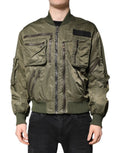 Dolce & gabbana veste bombers homme olive en satin avec plusieurs poches zippées et patch noir sur la poitrine