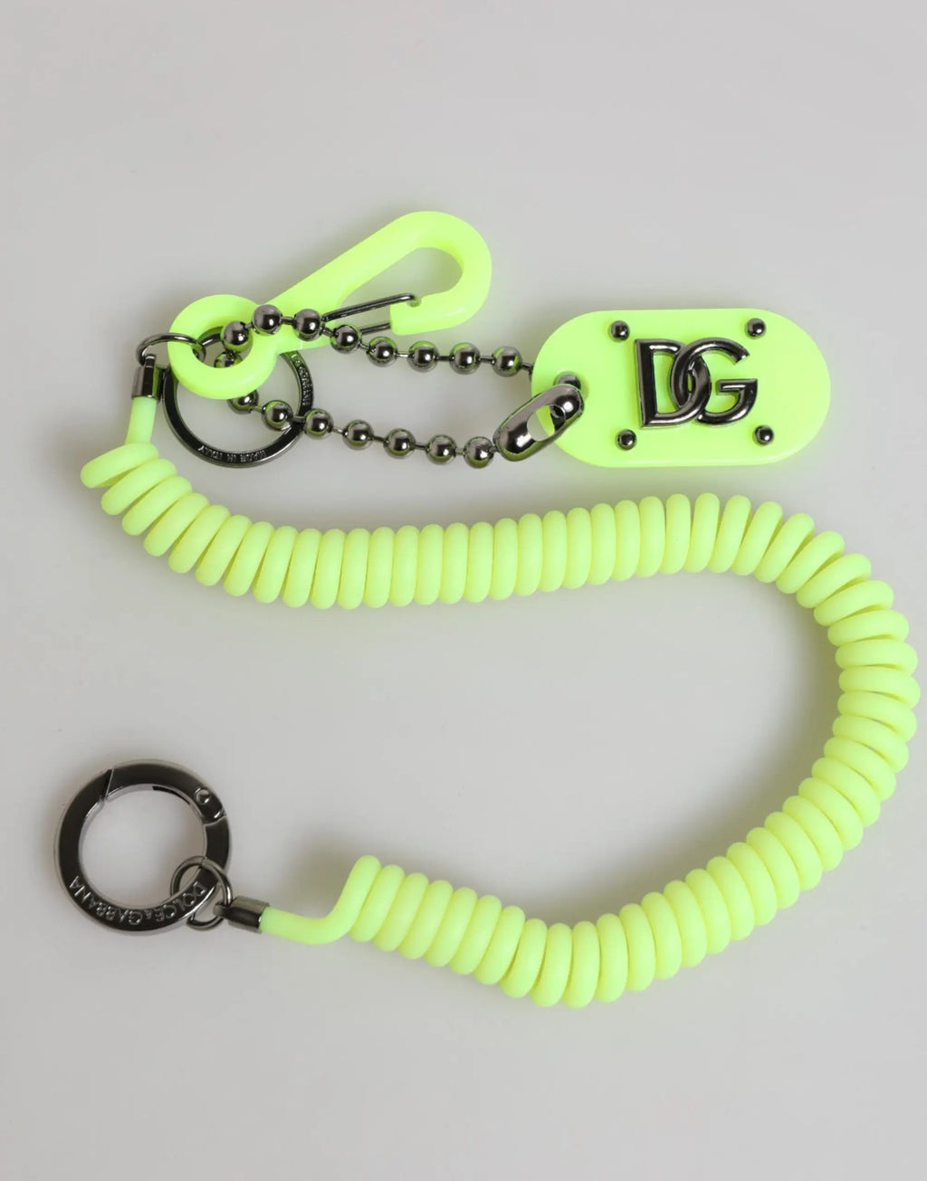 Dolce & gabbana porte-clés homme vert spirale en néon avec logo dg métallique et ferrures argentées