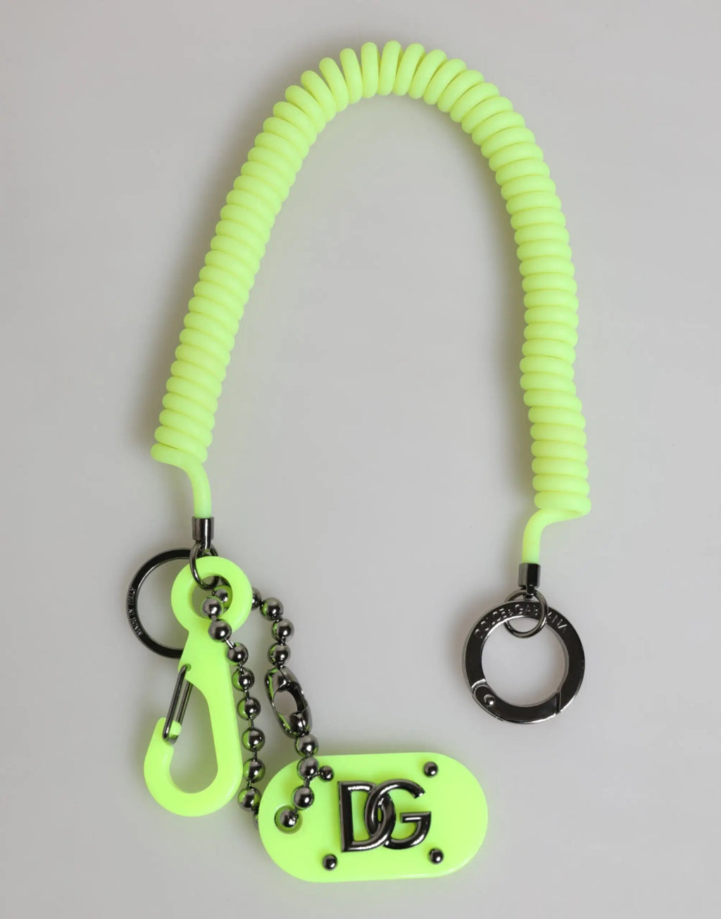 Porte-clés homme dolce gabbana vert néon en spirale avec logo dg métallique et accessoires noirs en métal