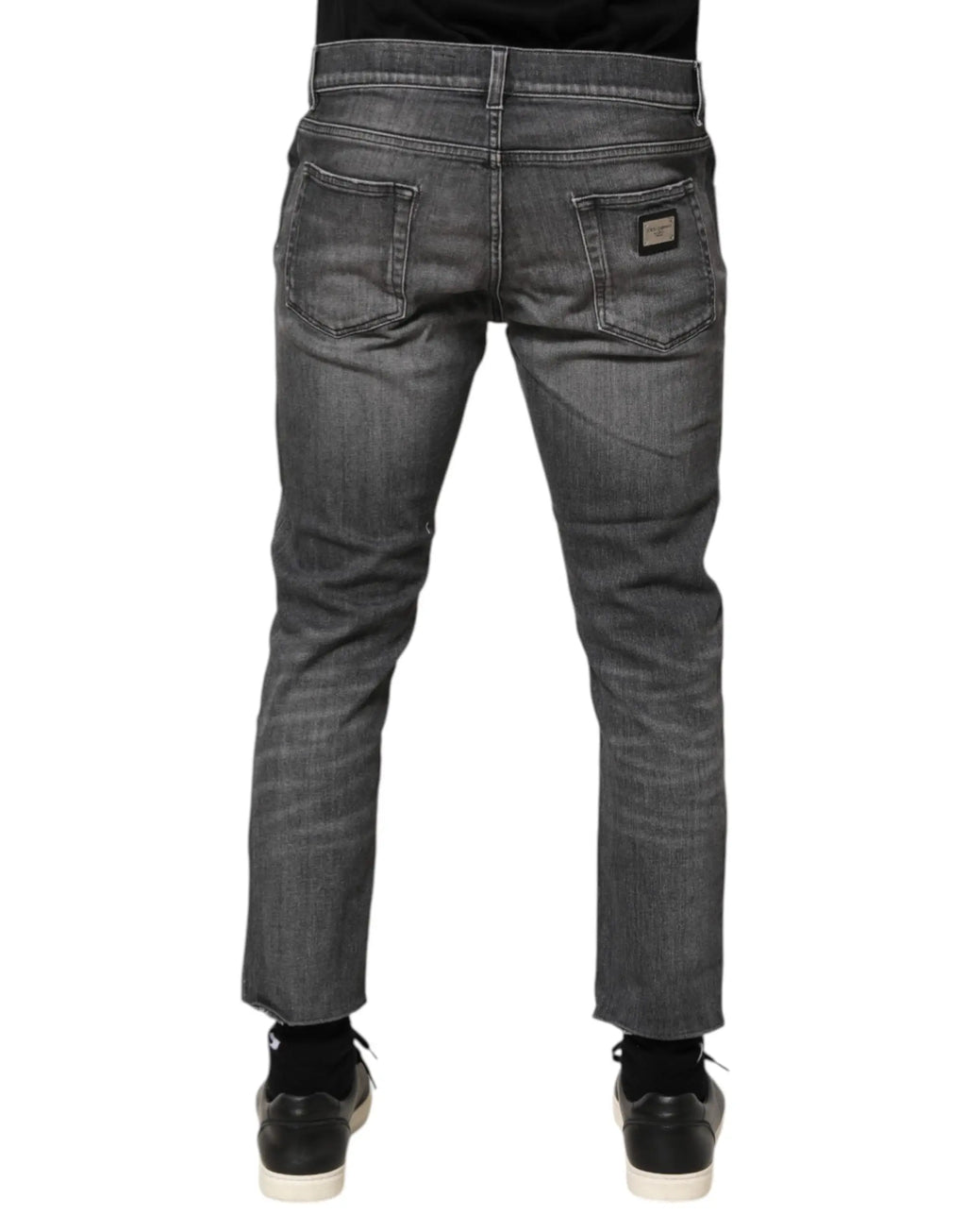 Jeans slim fit en denim gris foncé coton dolce & gabbana avec légère décoloration et patch de marque au dos droit