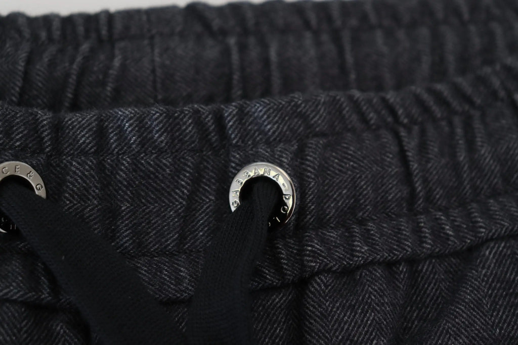 Pantalon tapered en coton gris dolce & gabbana avec motif chevrons noirs et œillets métalliques argentés