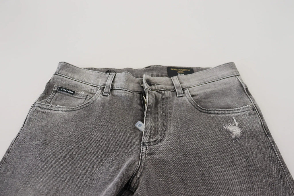 Jean slim en denim gris délavé en coton avec détails usés et étiquettes de marque dolce & gabbana