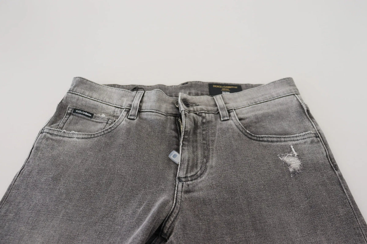 Jean slim en denim gris délavé en coton avec détails usés et étiquettes de marque dolce & gabbana