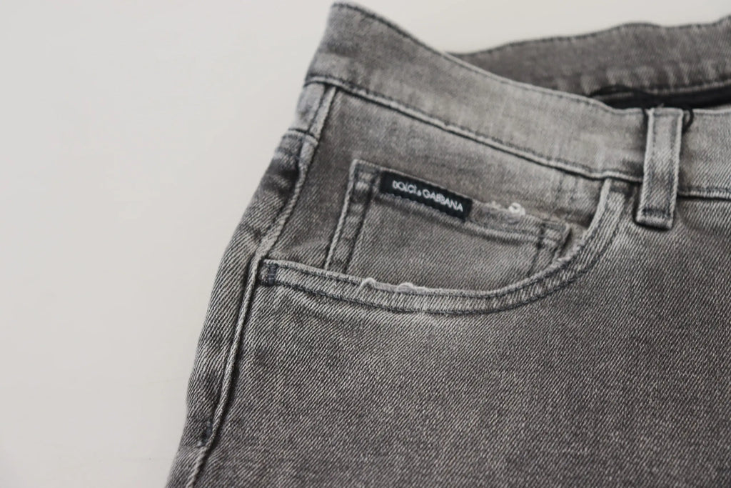 Jeans skinny en denim gris lavé en coton avec une légère décoloration et étiquette dolce gabbana au dos