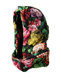 Chapeau dolce & gabbana multicolore en tissu matelassé avec motif floral vif en rouge rose jaune et violet sur fond noir