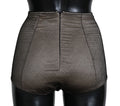 Sous-vêtements Dolce & Gabbana beige avec filet noir, bas de lingerie élégants et confortables, visible en première plan.