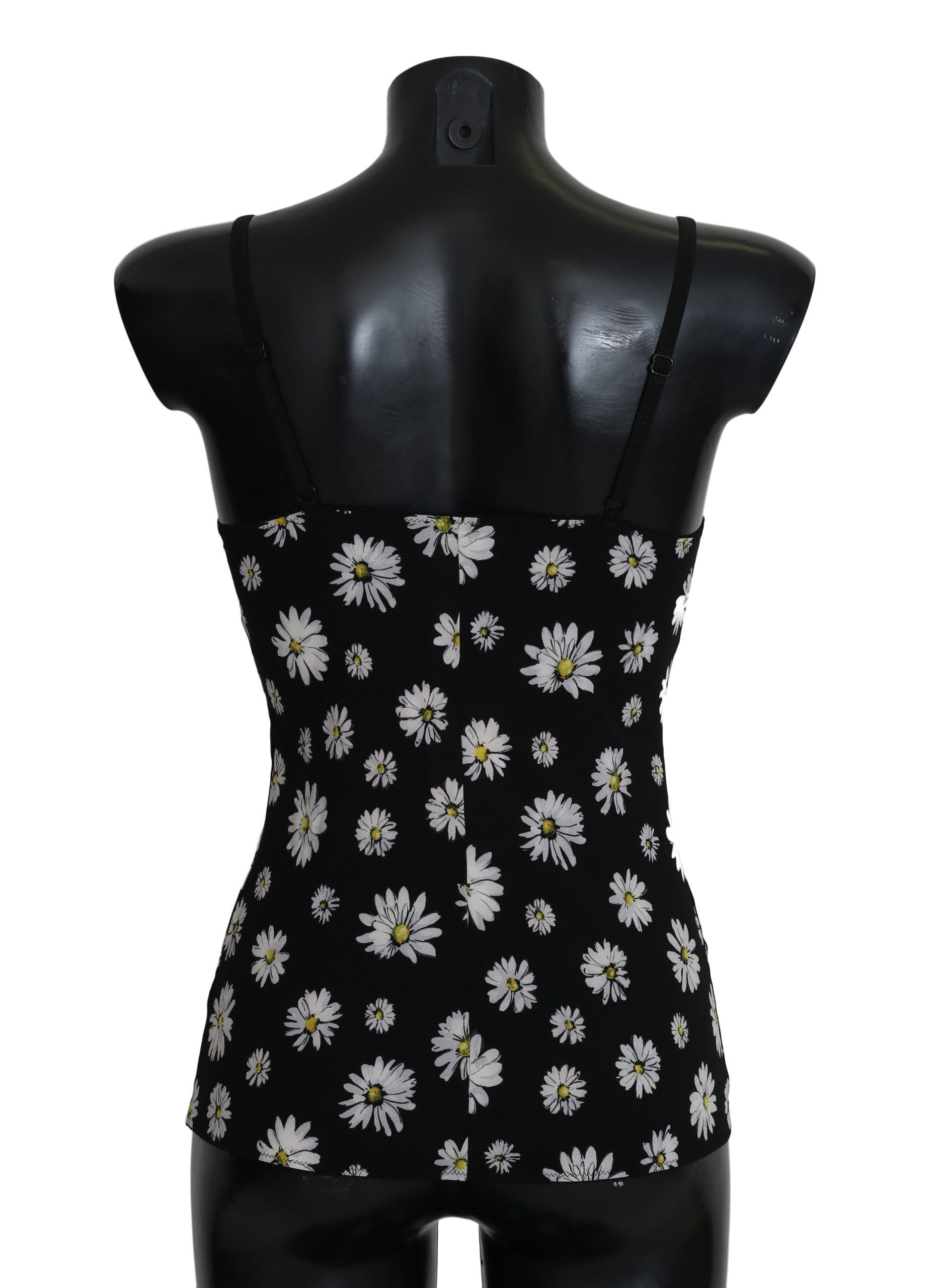 Robe lingerie noire Dolce & Gabbana avec imprimé marguerite, chemisier élégant en tissu léger, visible en gros plan.