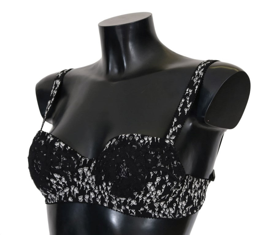Soutien-gorge en soie noire avec dentelle blanche et élasthanne, marque Dolce & Gabbana, visible en détail.
