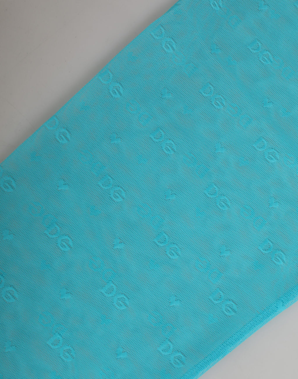 Sous-vêtements Dolce & Gabbana Light Blue Logo Lace, collants midi en dentelle, en tissu délicat et élégant.