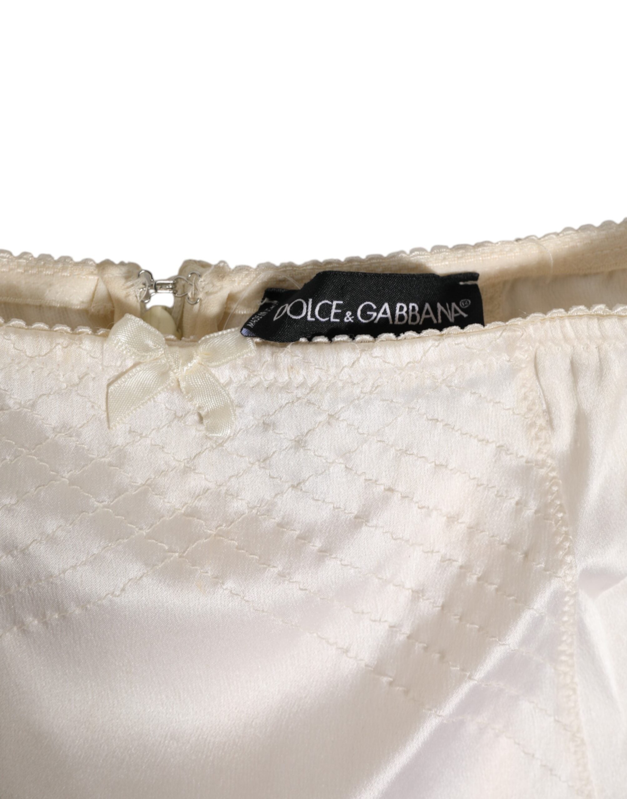 Culotte haute en soie blanche de Dolce & Gabbana, sous-vêtement élégant et confortable avec taille haute et finition raffinée.
