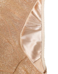 Culotte haute en satin beige Dolce & Gabbana en mélange de soie, vue de face avec détails élégants et finitions raffinées.