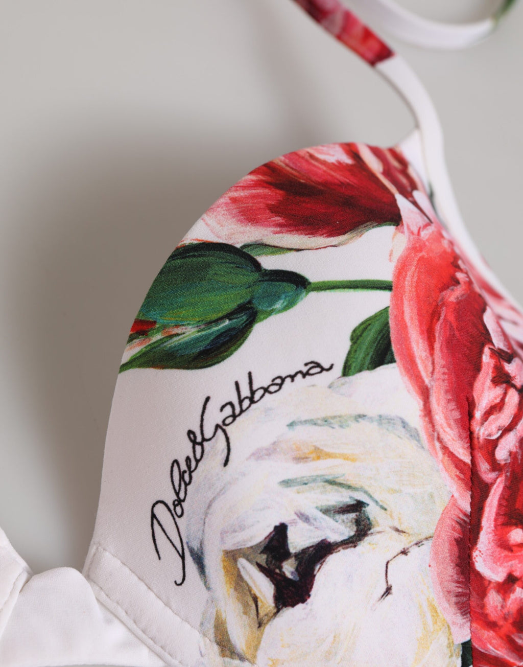 Bikini triangle blanc avec motif floral, haut de maillot de bain Dolce & Gabbana, style halter, vue de face