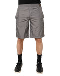 Shorts de bain en nylon gris clair Dolce & Gabbana avec taille élastique, parfaits pour la plage ou la piscine.