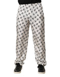 Pantalons décontractés en soie blanche à fleurs de Dolce & Gabbana, style lounge confortable et élégant.