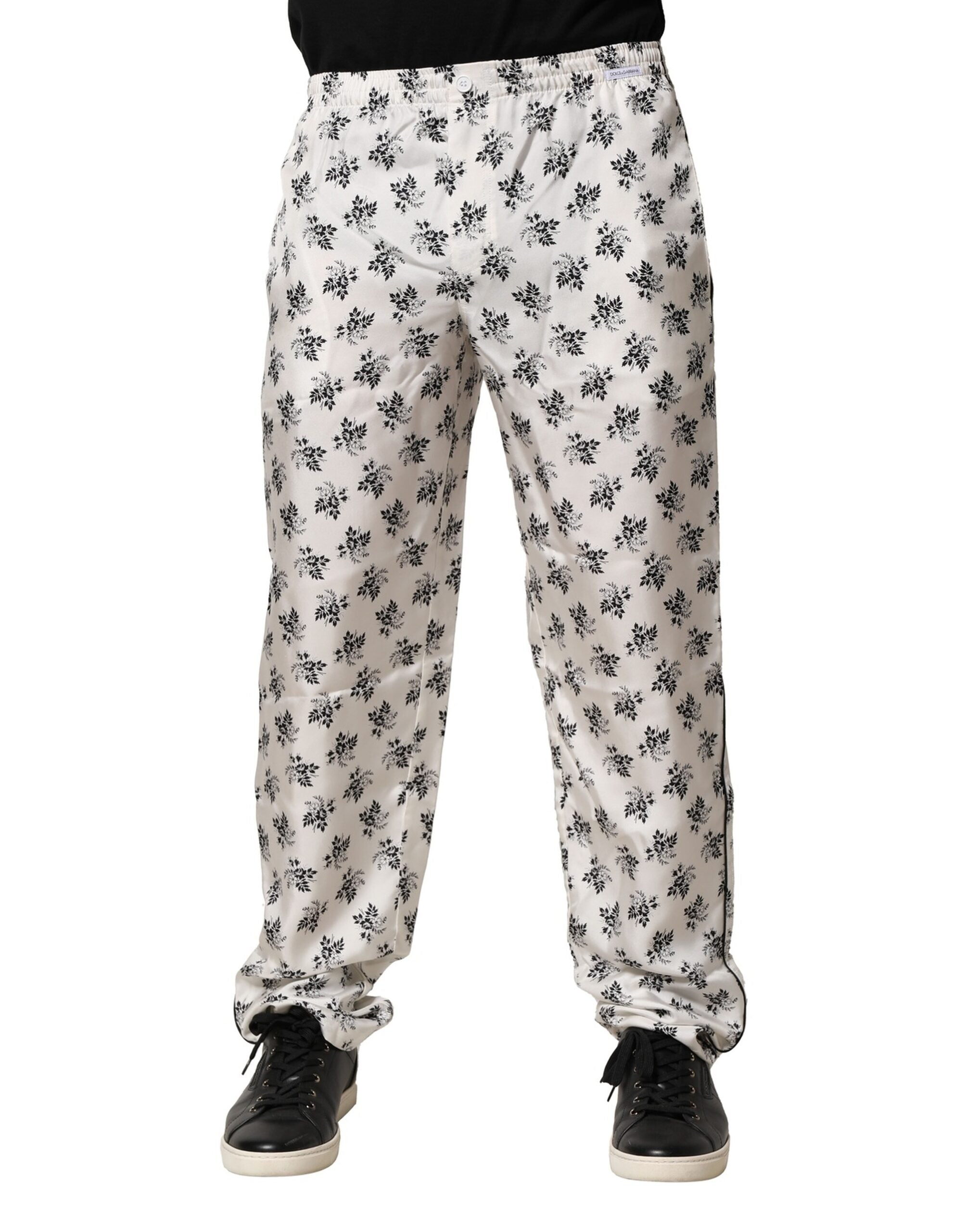 Pantalons décontractés en soie blanche à fleurs de Dolce & Gabbana, style lounge élégante et confortables.
