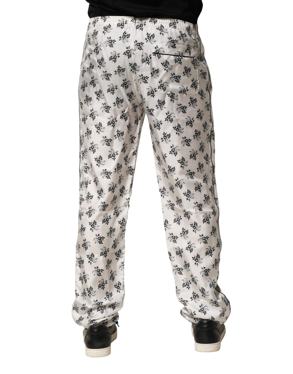 Pantalon de détente en soie blanche à fleurs Dolce & Gabbana, style décontracté et élégant pour femme.
