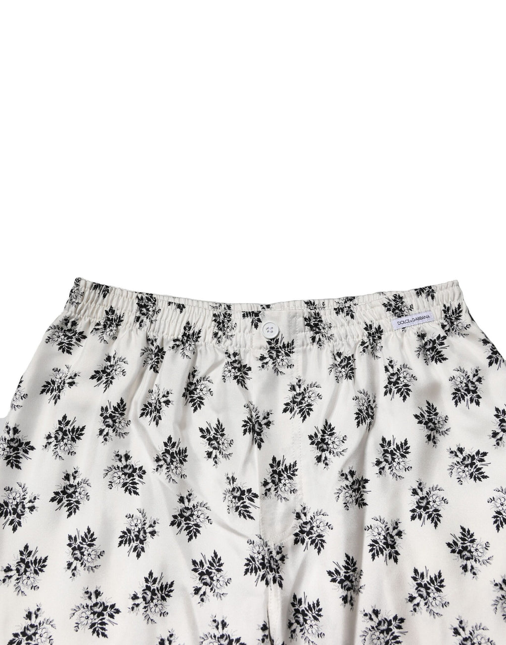 Pantalons de détente en soie blanche à fleurs Dolce & Gabbana, pantalon casual élégant avec motif floral.