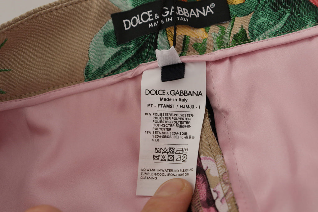 Robe beige florale Dolce & Gabbana avec taille haute, style formel, parfaite pour une occasion élégante.