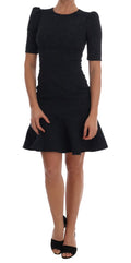 Robe courte Dolce & Gabbana noire et bleue avec coupe évasée, style mini dress, portée élégante et tendance.
