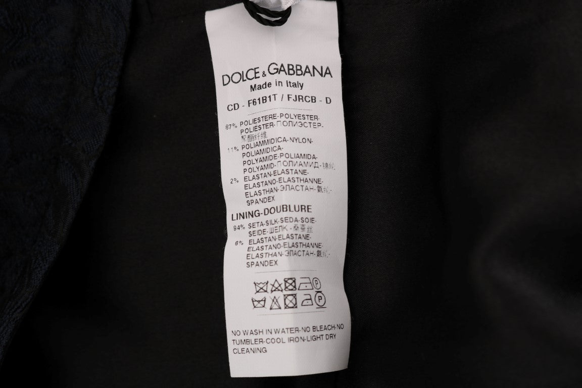Robe courte Dolce & Gabbana noire et bleue à coupe évasée, style mini, portée élégante et moderne.