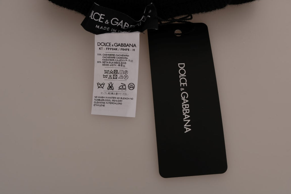 Collants noirs en cachemire et soie de Dolce & Gabbana, tissu extensible, portés avec un look élégant et sophistiqué.