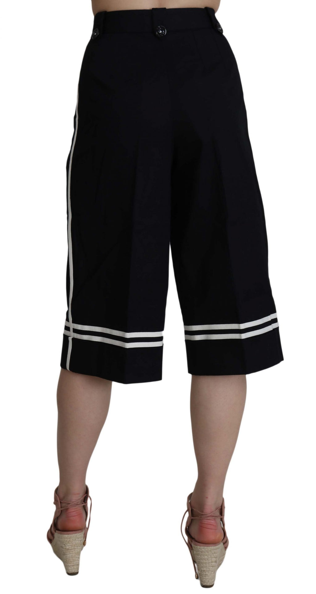Pantalon noir en coton Dolce & Gabbana, coupe courte avec embellissements, vue de face sur un fond neutre.