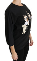 T-shirt en soie noir Dolce & Gabbana #dgfamily, haut élégant avec logo, porté sur un mannequin.